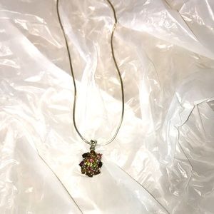 I’m selling this gem necklace the chain is real silver